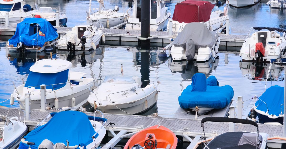 Guests enjoying champagne on the deck of a private yacht